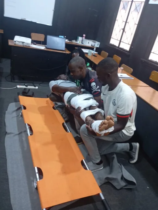 Participants practising first aid during a Lifeline First Aid training session.